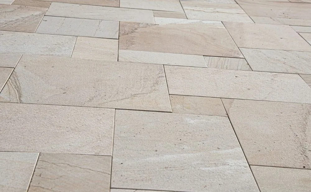 Rustic tiled surface in a landscaped garden area