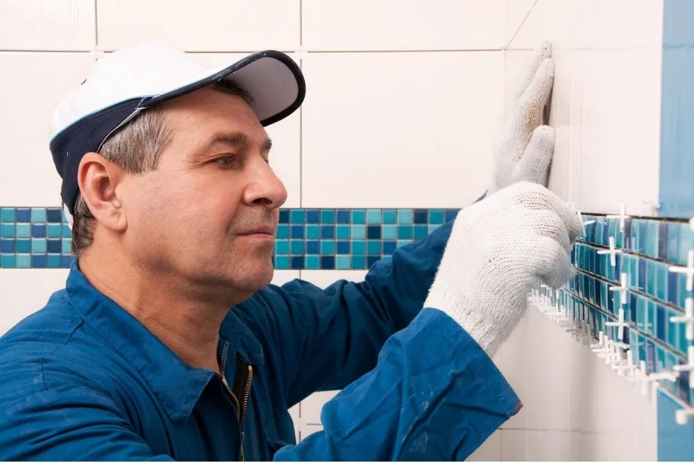 Grouting freshly laid tiles during installation